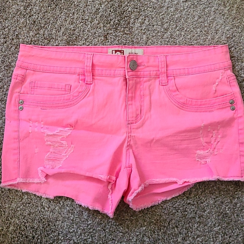 Hot PINK shorts.